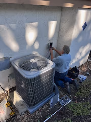 HVAC equipment and ductwork installed in attic