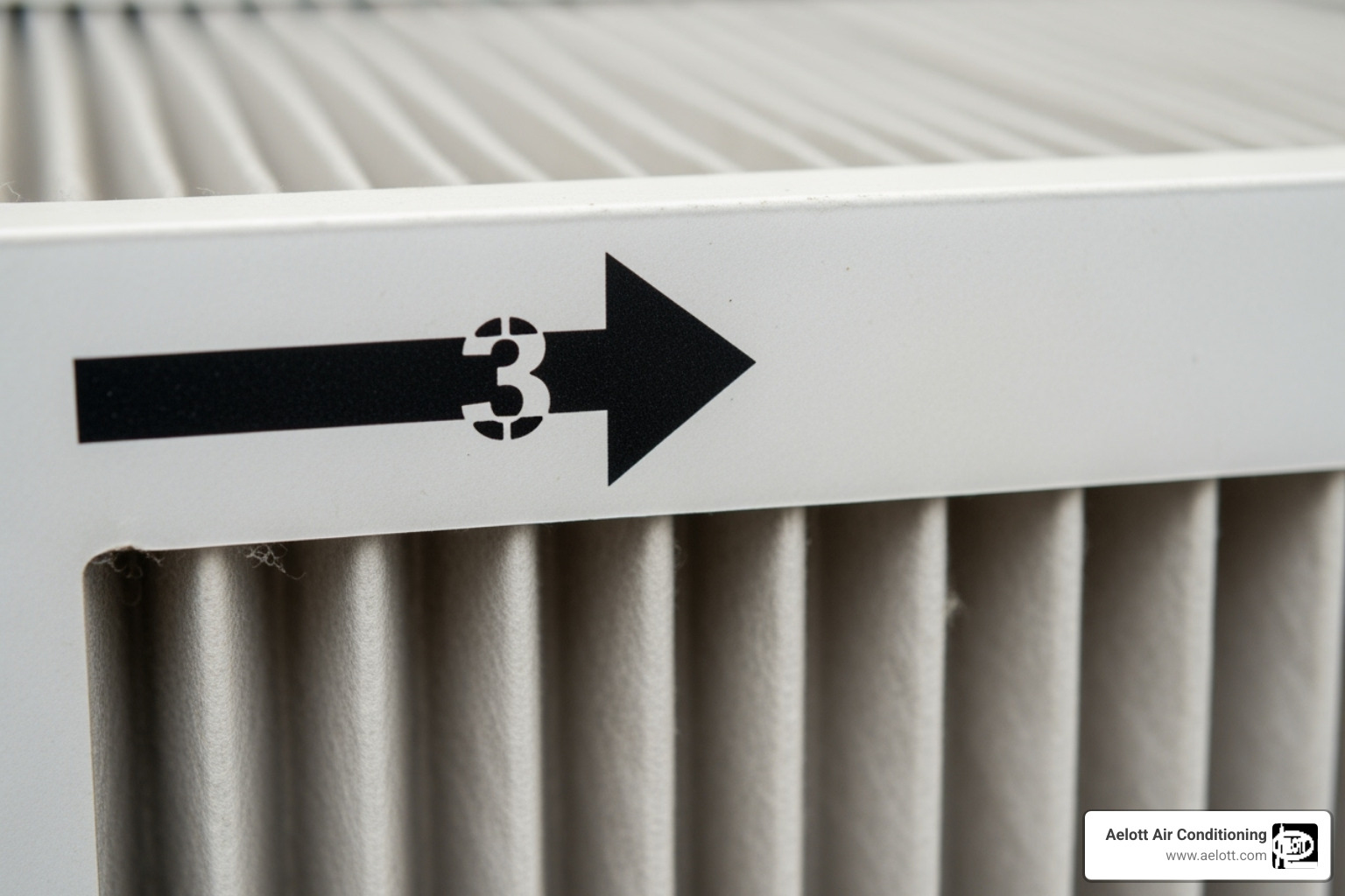 Arrow indicating airflow direction on a filter frame - AC filter replacement Arrow indicating airflow direction on a filter frame - AC filter replacement